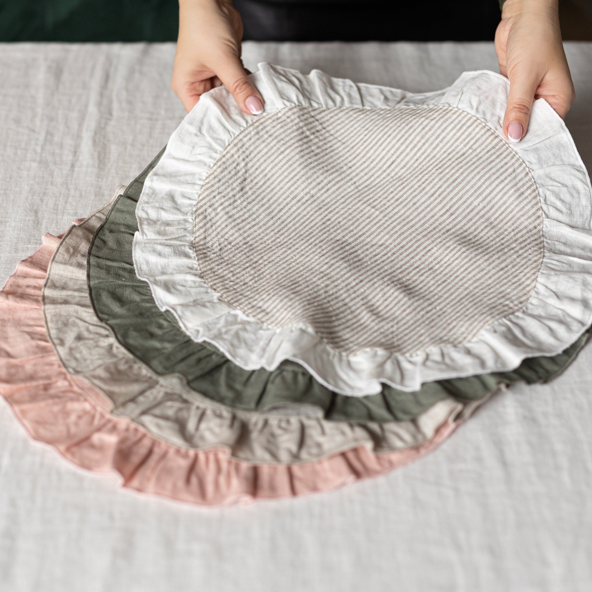 Round linen placemats, tablemats with ruffles